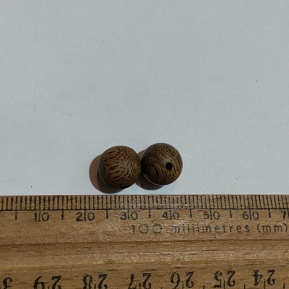 Lot of 2 2.5ct 10 mm sinking grade aquilaria agar wood, oud beads from Vietnam